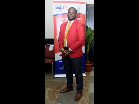 Ramon Smith, son of Winston Smith, immediate past president of the JTA, was looking dapper in his red jacket at the opening session.
