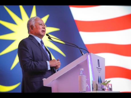 FILE – Malaysia’s Prime Minister Najib Razak speaks during the World Capital Markets Symposium in Kuala Lumpur, Malaysia, February 6, 2018. 