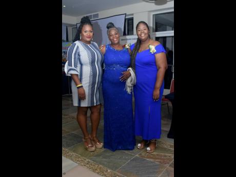 Credit: Ashley Anguin In attendance to support newly installed president of the JTA, La Sonja Harrison, were family members (from left): niece Cherrikay Hibbert, mother Enid Williams and daughter Ewanna Harrison.