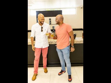 Credit: Contributed A joyful heart is good medicine! Just ask Daniel T. Edwards, owner and founder of The 180 Vision (left) and entrepreneur, Carey Chin who connected at the event.