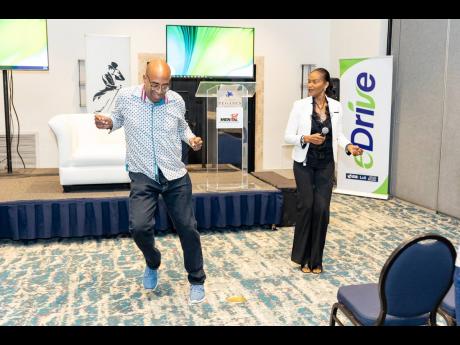 Credit: Contributed Look who’s dancing now! Raymond Campbell, an attendee busted out his moves as Ruthlyn Johnson, Customer Service Area Manager - East at JPS got the audience warmed up and ready for her presentation.