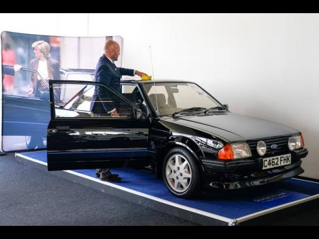 The Ford Escort RS Turbo Series 1, which belonged to the late Diana, Princess of Wales, is seen during a preview of an auction at Silverstone circuit in Northamptonshire, England.