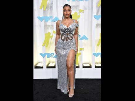 Chloe Bailey donned a custom Zigman corset dress and Jimmy Choos.