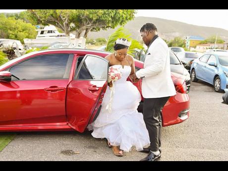 Chivalry is certainly not dead for Mr Cameron, who escorts his wife, Mrs Cameron, from the vehicle on their wedding day.