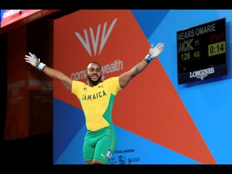 Credit: AP Jamaica’s Omarie Mears celebrates making a lift during the men’s 81kg weightlifting competition at the 2022 Commonwealth Games in Birmingham, England.