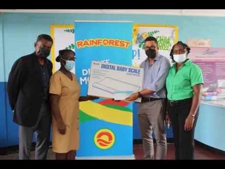 Rainforest Caribbean was proud to hand over a digital scale for newborns as well as funds for the refurbishing of the medical records storage room at the Slipe Pen Road Comprehensive Health Centre as part of its long-standing partnership through the Minist