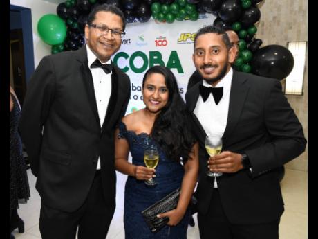 From left: Richard Pandohie, CEO of Seprod,and Terri-Ann and Vishwanauth Tolan were all smiles for our shutterbug.