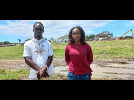 Credit: Ian Allen Kimberley Thompson listens intently as Omar Ryan (both of Botany Bay, St Thomas) makes a point about what he wants for St Thomas.