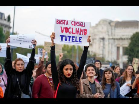 People stage a protest on ‘International Safe Abortion Day’ to ask for more guarantees on the enforcement of the abortion law that they claim is seriously endangered by the high rate of doctors’ conscientious objection in the country, in Milan, Wedne