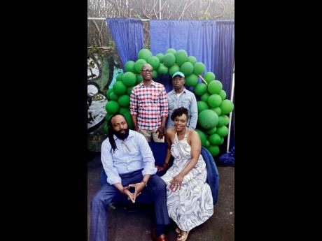 Credit: Contributed The Douglas family. In back (from left); Anthony Douglas, Errol Douglas.
Front (from left) ; Collin Douglas and Suzie-ann Douglas.