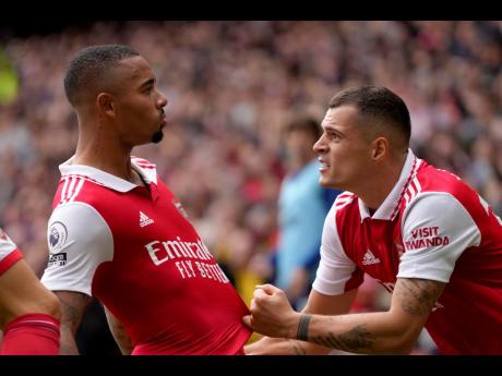Credit: AP
Arsenal’s Gabriel Jesus (left) celebrates with Arsenal’s Granit Xhaka after scoring his side’s second goal during an English Premier League football match against Tottenham Hotspur at Emirates Stadium, in London, England, yesterday.