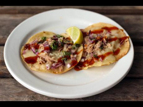 The open-face smoked tuna taco is simple but is a tasty appetiser. 