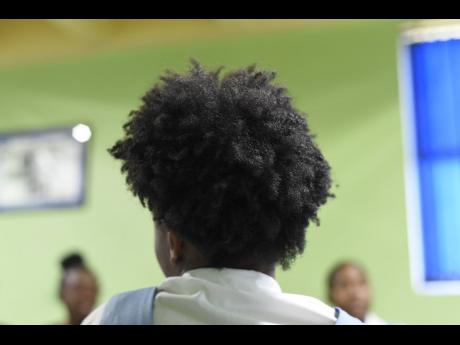 Embracing Your Roots Club members at Ardenne High School in their natural hair.  File