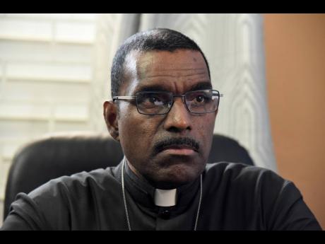 Father Sean Major-Campbell Ian Allen