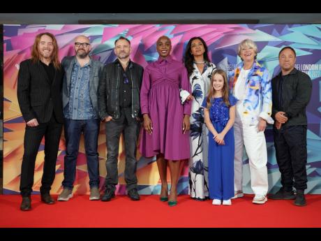 The cast of ‘Roald Dahl’s Matilda The Musical’ (from left): Tim Minchin, Dennis Kelly, Matthew Warchus, Lashana Lynch, Sindhu Vee, Alisha Weir, Emma Thompson and Stephen Graham pose for photographers.