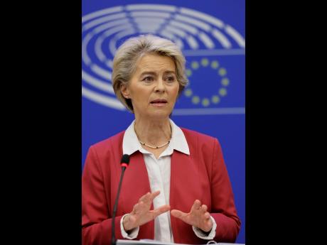 European Commission President Ursula von der Leyen gestures as she presents new measures to tackle high energy prices during a media conference at the European Parliament, on Tuesday, October 18, in Strasbourg, eastern France. (AP Photo/Jean-Francois Badia