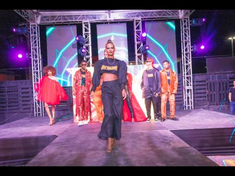 Xavier Sahadeo wowed the audience with this  a black laced wide-legged pant and cropped blouse.