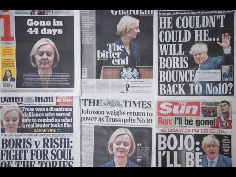 A selection of the front pages of British national newspapers showing the reaction the the resignation of Prime Minister Liz Truss, in central London on Friday, October 21. 