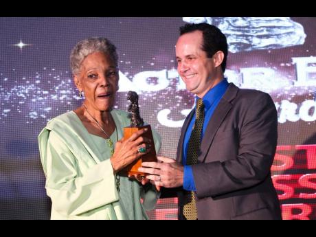 Leonie Forbes accepts her gong for Best Actress in Lead Roleat the 2015 Actor Boy Awards.