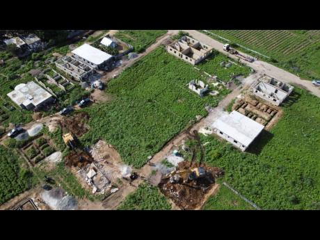 An aerial view of the Clifton community, where illegally built structures were recently demolished by the Government.