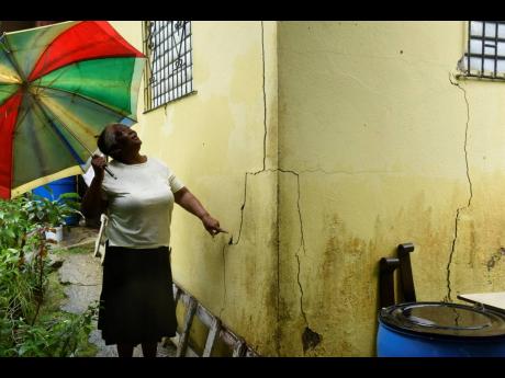 As the rain fell on Tuesday, 62-year-old Mavis Solomon prayed that her home would withstand any impact from Tropical Storm Lisa as it passed south of the island.