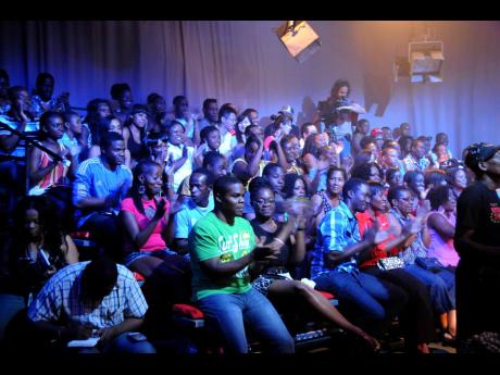 
A section of the audience at TVJ studios at Lyndhurst Road enjoying the Digicel Rising Stars performances. 