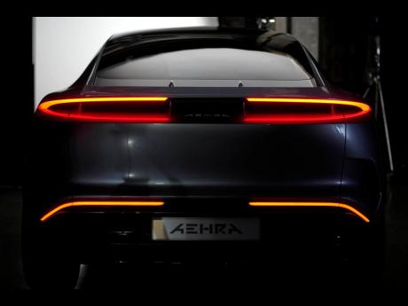 Credit: AP The new Aehra electric vehicle is lit on a set for a photo shoot in Milan, Italy on October 20, 2022.
