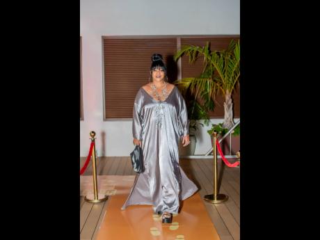 Award Winning Celebrity Hairstylist and  Fashion Designer, Lisa ‘Neahlis’ McIntosh, owns the gold carpet in silver at the Johnnie Walker Keep Walking Session.