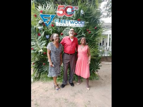 From left: Retirees Eulalee Barnaby and Gordon Lawrence share a laugh with Conceta Cunningham-Williams.