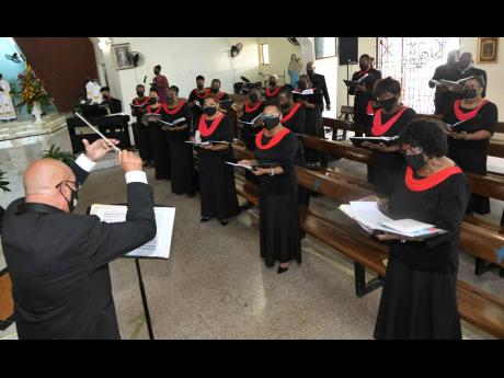 Credit: File Musical director Winston Ewart at the National Chorale of Jamaica’s church service and candle lighting ceremony to honour the lives lost during the COVID-19 pandemic at St Theresa Roman Catholic Church in Vineyard Town on Wednesday, August 4, 2021.
