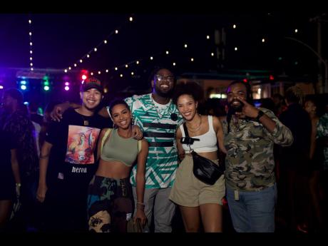 From left: Cameron Phang Sang of Di Lot alongside a few of the key members of the New Wave team, Lindsey Lodenquai, Yannick Reid, Alysia Francis and Travis-John Bailey, having a blast at the event.