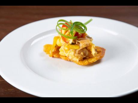 From the appetiser menu, customers can enjoy ackee and salt fish on top of tostones (fried and pressed green plantain).