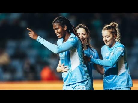 Reggae Girl Khadija Shaw (left).