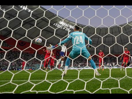 England’s Raheem Sterling, the star from Maverley in Jamaica, nets one of The Three Lions’ six goals in defeating minnows Iran. 