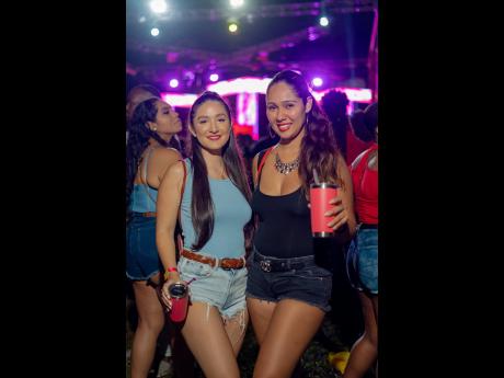 Credit: Contributed Where there is soca you’re sure to see Caitlin Thwaites (left) and Danielle Cross having a good time.