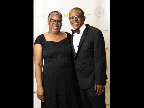 Courtney Campbell (right), president and chief executive officer, VM Group, and his lovely wife Pauline.