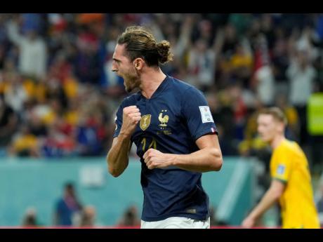 Credit: AP France’s Adrien Rabiot celebrates after scoring his side’s opening goal during the World Cup Group D match between France and Australia, at the Al Janoub Stadium in Al Wakrah, Qatar on Tuesday.