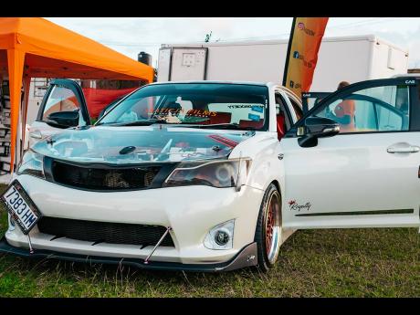 Custom clear hood on this Toyota Axio. 