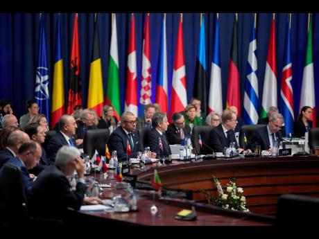 United States Secretary of State Antony Blinken attend the first day of the meeting of NATO Ministers of Foreign Affairs, in Bucharest, Romania, yesterday.