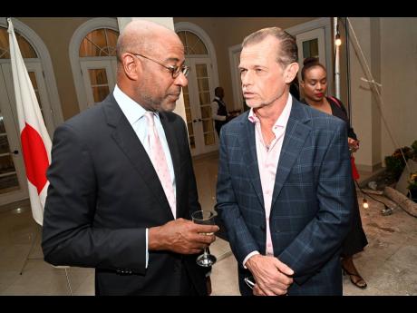 Former Jamaican Ambassador to Japan, Ricardo Allicock (left) caught up with Head of Fujitsu Caribbean and Latin America, Mervyn Eyre.