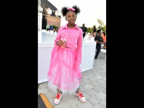 The stylish Amboree Bullock was ‘tulle-tally’ perfect in pink as she enjoyed a shake ahead of the start of the Island Child Style show.
