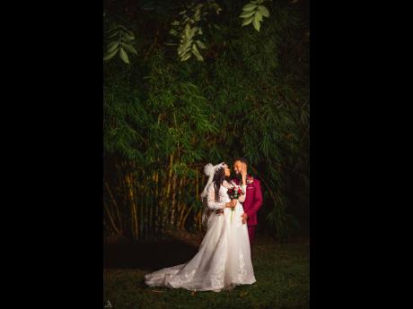 The couple gaze longingly into each other’s eyes while embarking on a new journey into happily everafter.