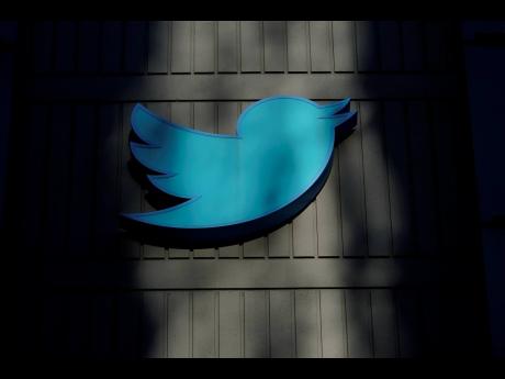 A sign at Twitter headquarters is shown in San Francisco.
