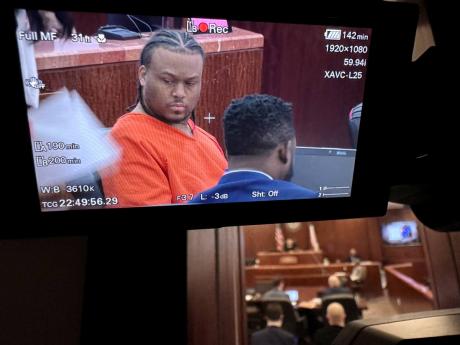 Credit: AP Patrick Xavier Clark, accused of fatally shooting rapper Takeoff last month outside a Houston bowling alley, is displayed on camera monitor during a court appearance on Wednesday, in Houston.