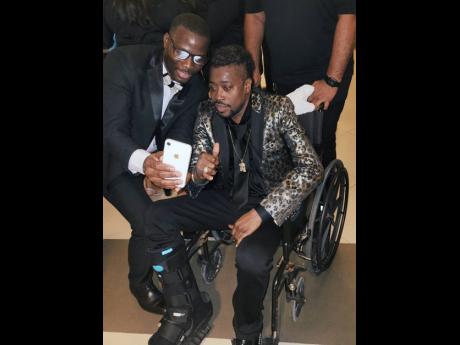 A selfie moment with Beenie Man, even when he’s sitting in a wheelchair, is an opportunity not to be missed. 
