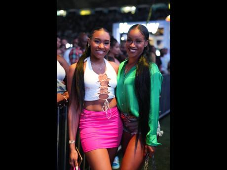 Credit: Gladstone Taylor Sprinter Briana Williams (right) and friend D’Jannah Shaneece made it a girls night out.