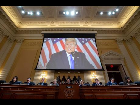 A video of former President Donald Trump is shown on a screen as the House select committee investigating the January 6 attack on the US Capitol holds its final meeting on Capitol Hill in Washington, on Monday.