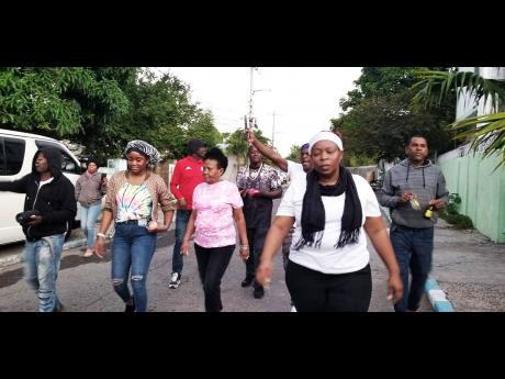 Members of the August Town Community Development Council who went carolling in the Hermitage area on Christmas morning.