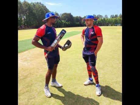Brenton Parchment (left) with former Jamaica and West Indies team-mate Ricardo Powell at Powell’s coaching academy in Atlanta, United States.