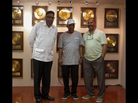 Musicians Kenneth Gamble (left), Leon Huff (centre), and Thom Bell stand together at Gamble and Huff Music, on Broad Street, in Philadelphia, on Thursday, May 30, 2013. Bell, the Grammy-winning producer, writer and arranger, died at age 79 on Thursday, Dec